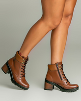 Bota zíper e cadarço
